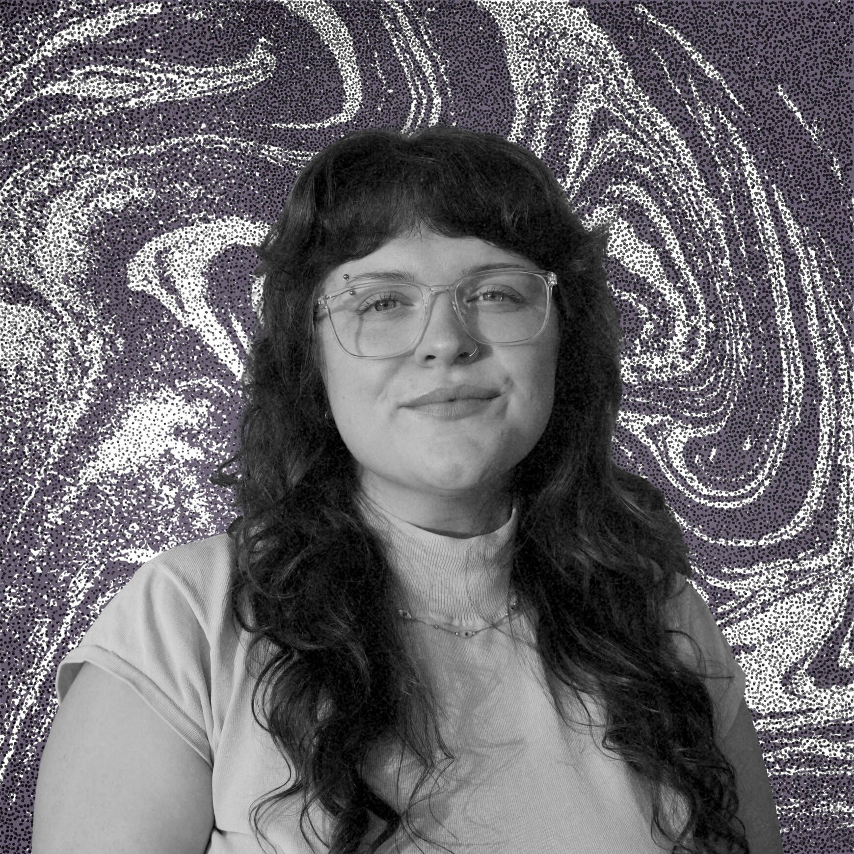lauren burns Black and white photo of a young woman with long curly hair, micro bangs, facial piercings, and clear frame glasses. She is smiling slightly. The background is a purple, black, and white grainy swirl pattern.